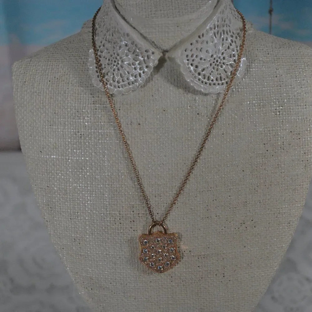 Sparkling Rose Gold Tone Shield Pendant Necklace with Clear Rhinestones